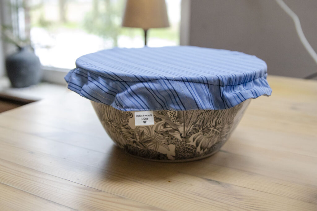 Herbruikbare afdekhoes blauw streepjes